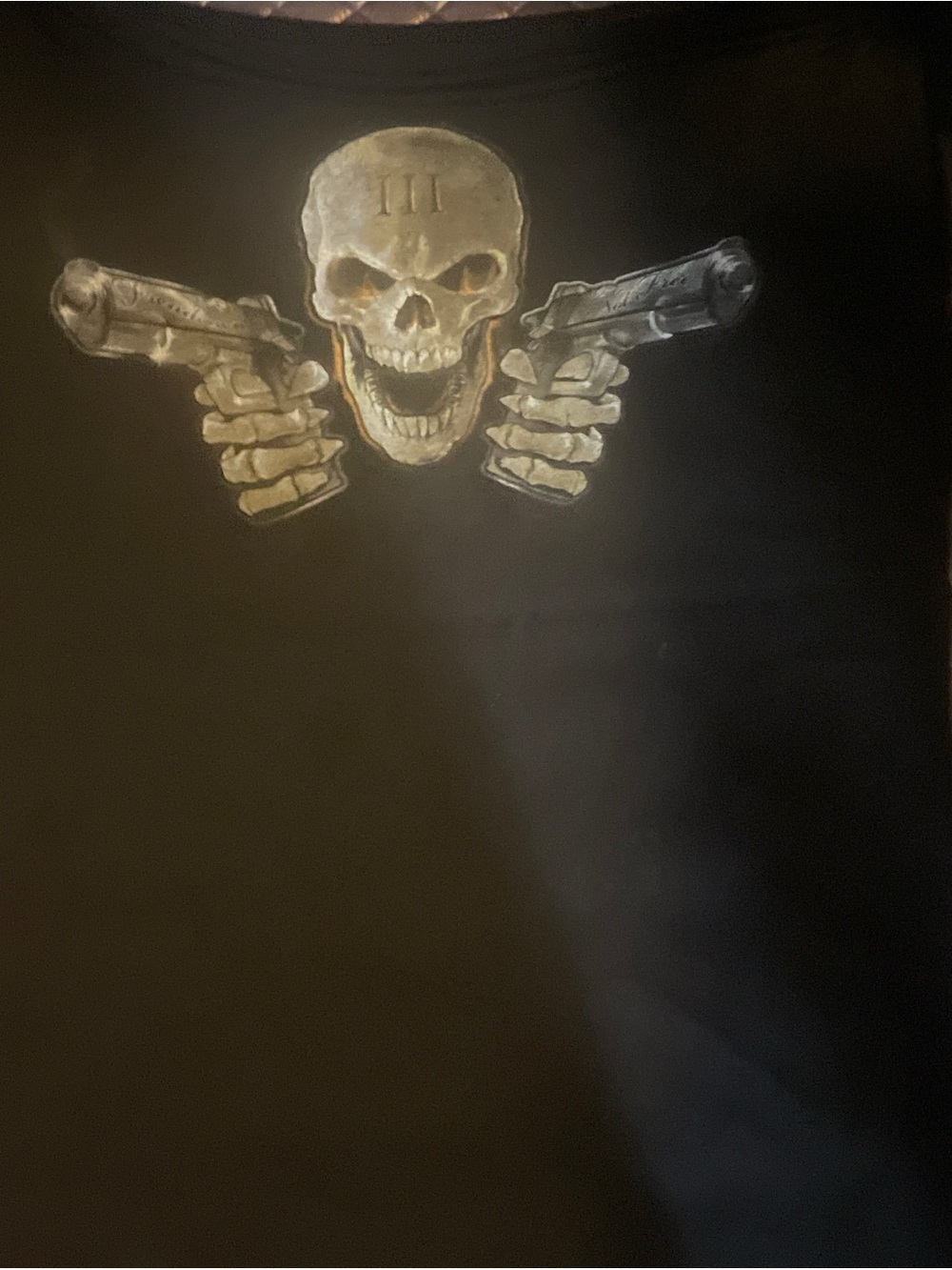 Black Tee with Skull and Dual Pistols Graphic